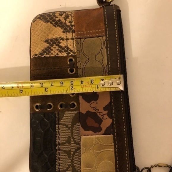 COACH patchwork wristlet metallic brown embossed